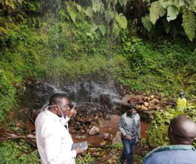 Mayor Tanjong Martin and Council Staff on a hillsite tour for more touristic site locations within Tubah Municipality